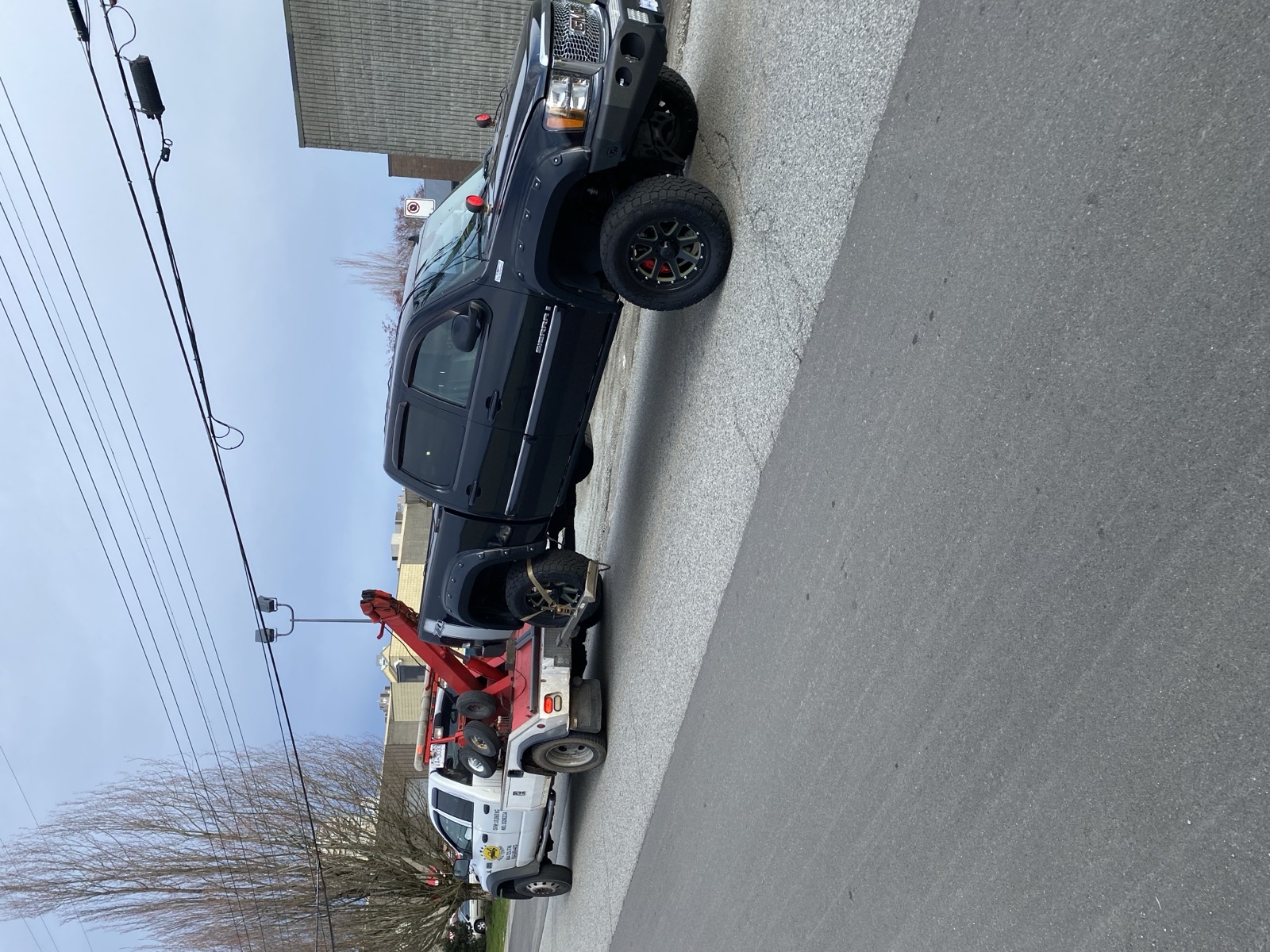 Towing a lifted pickup truck
